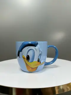 TAZA RELIEVE DONALD 550 ML