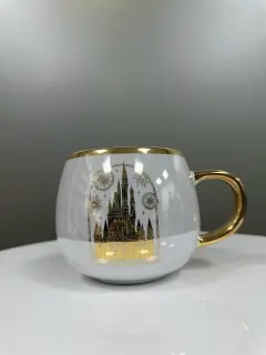 TAZA DISNEY DORADA CON BLANCO