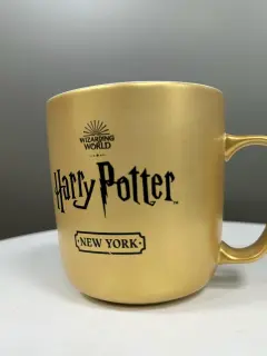 TAZA HARRY POTTER GOLD