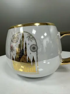 TAZA DISNEY DORADA CON BLANCO