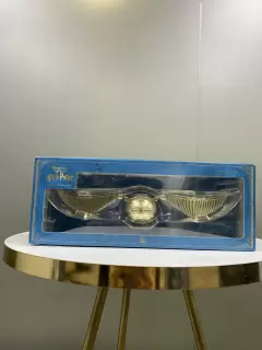 FIGURA SNITCH DORADA